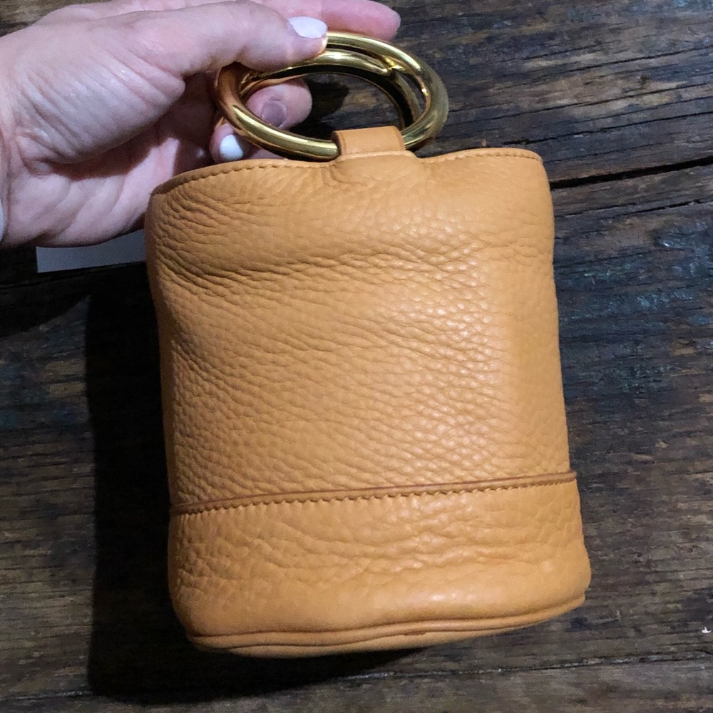 Simon Miller small mustard leather purse. NWT.